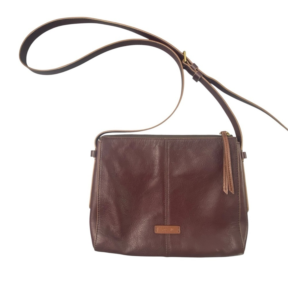 Fossil leather crossbody bag in wine/burgundy color with tasseled zipper